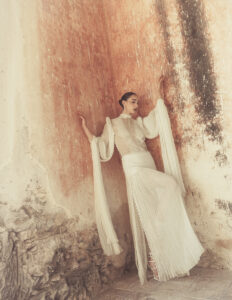 bride against the textured walls of a hacienda in Mexico Hacienda San Antonio Hool Merida Wedding Editorial